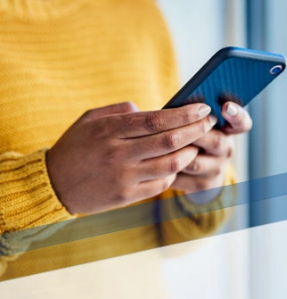 hands holding mobile phone